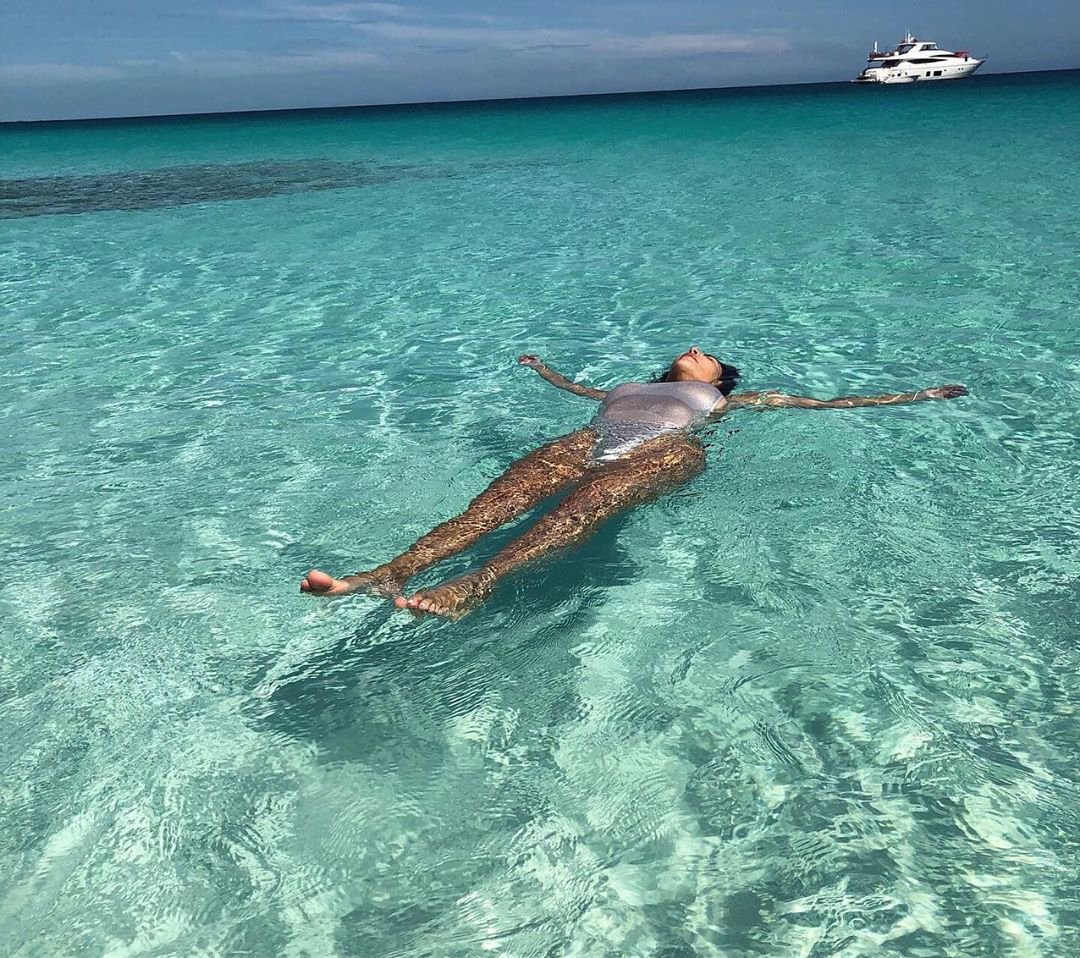 Kim Kardashian in Sexy Silver Swimsuit Photoshoot on The Beach