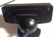 Back of PS3 Eye with screw covers removed. (ps eye expose screws)
