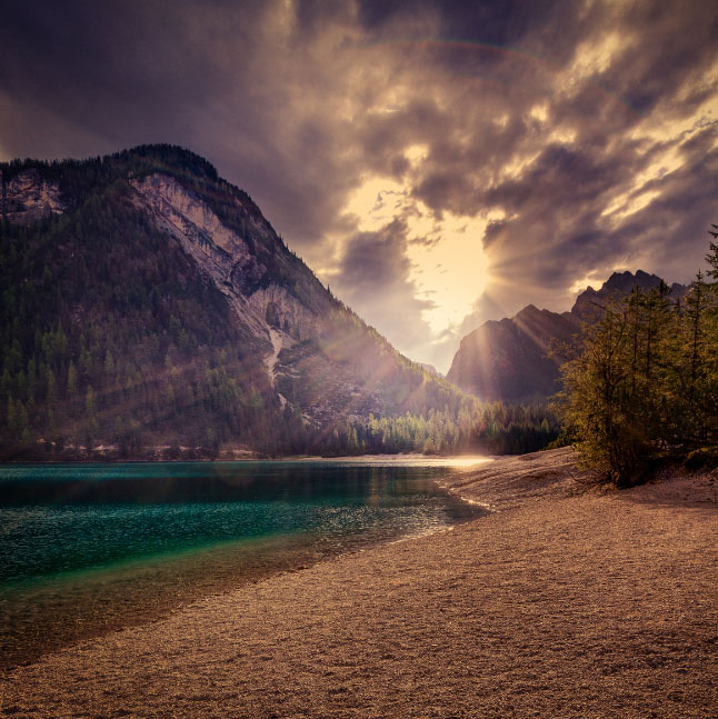 Crystal Clear Emerald Prags Lake in Tyrol, Italy