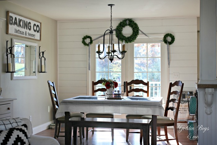 Dining area with wall planks - shiplap - and World Imports Brondy chandelier - www.goldenboysandme.com