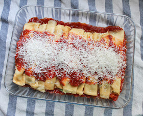 Food Lust People Love: Use your favorite greens to make Greens and Pea Manicotti, a lovely savory vegetarian main course of crepes filled with peas, goat cheese, ricotta and, of course, greens, covered in a fragrant tomato sauce.