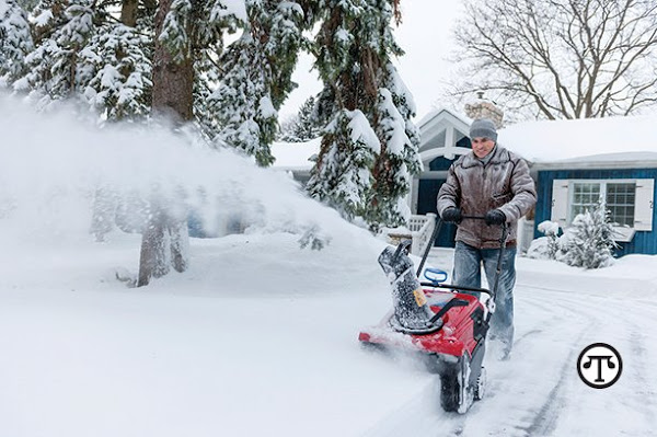 Man using a snow thrower