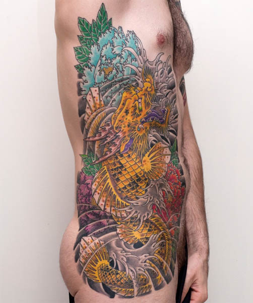This amazing side tattoo combines the traditional Japanese koi with a dragon 