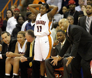 Syracuse women's basketball coach Quentin Hillsman reacts to a missed shot against UConn