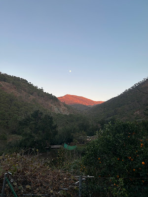 Picture of the moon over the mountains