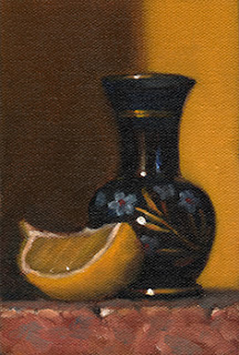 Still life oil painting of a lemon quarter beside a small painted-glass vase.