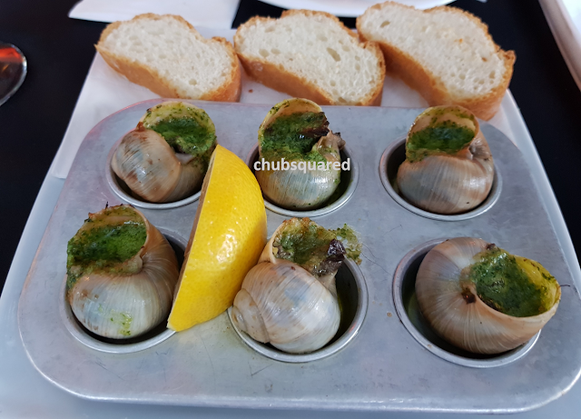 zinc kuching escargots