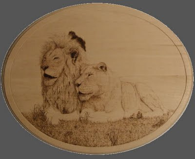 two lions pyrography in progress