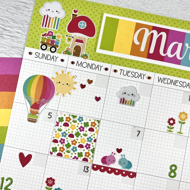 12x12 March Calendar Scrapbook Page with hot air balloon, sunshine, & mushroom