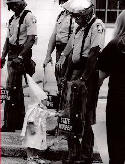 KKK Toddler with Black Cop