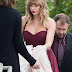 Taylor Swift is booed by fans who waited in rain to see her in bridesmaid's outfit after best friend's wedding