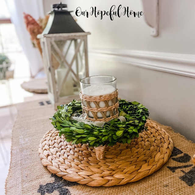 willow wrapped candle in boxwood wreath