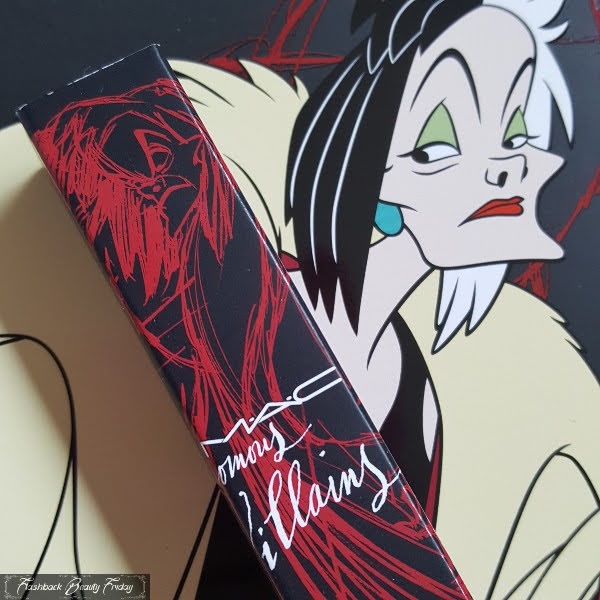 close up of red sketch of Cruella De Vil on black box of lipgloss