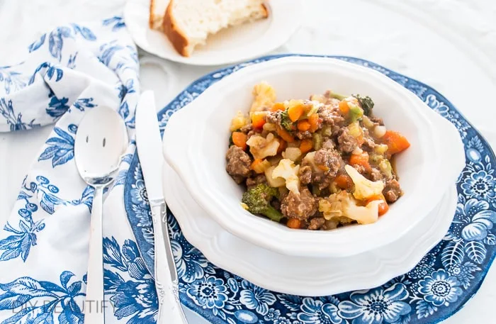 beef stew on blue and white plates