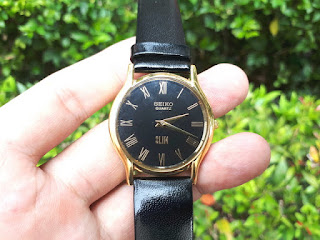 Jam Tangan Seiko Slim Quartz Gold Plated Black Roman Dial SK007