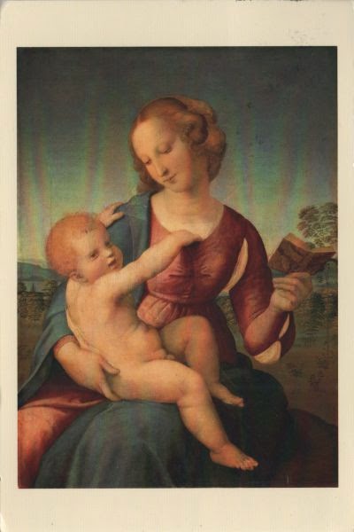 Madonna holding book and child