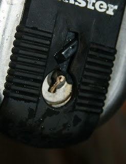 The half of the key left in the padlock