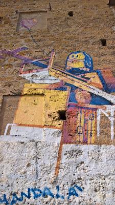 Street art on walls around central Palermo.