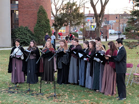 Dean College carolers warmed up the crowd with holiday songs before and after the tree lighting