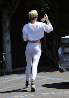 Miley Cyrus at a parking lot