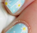 http://onceuponnails.blogspot.com/2015/04/daisies-and-dots.html