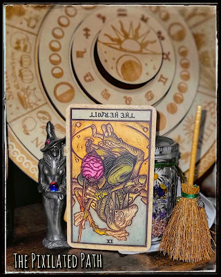 The Hermit card from The Dark Crystal Tarot in the reversed position.