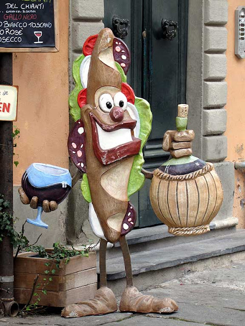 Sandwich prop with glass and flask of wine, Pisa