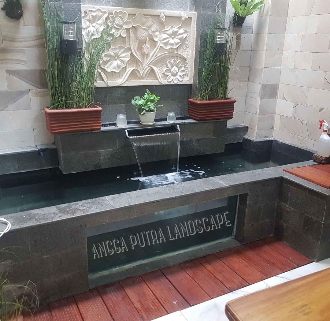 Jasa pembuatan dekorasi kolam tebing,dekorasi relief air terjun mojokerto