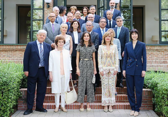Queen Letizia wore a bow detail jumpsuit by Mango. Letizia wore her Mint and Rose Sardinia suede shoes