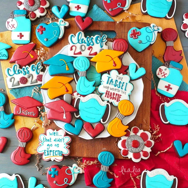 Brightly colored graduation chocolate decorated sugar cookies