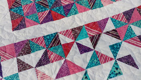 Heart quilt with quarter square triangles