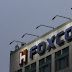 Foxconn to buy all 200 billion yen preferred shares from Sharp's creditor banks - source