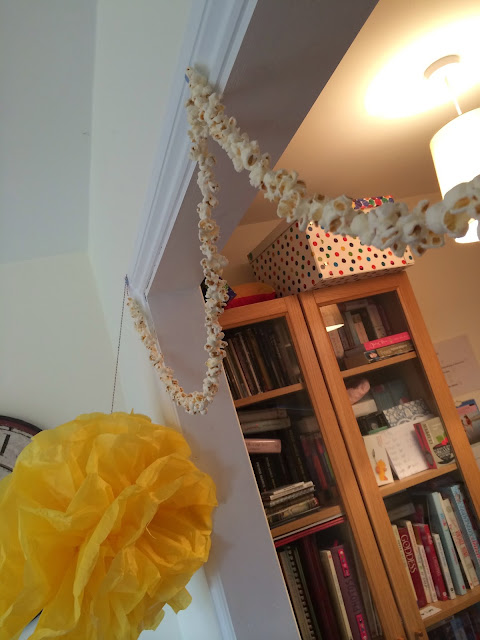 tissue pompoms and popcorn garland