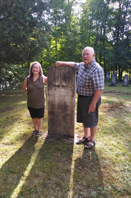 Jeannie Tilson and Doug Tennant at the Thomas Tennant and Anne Hill gravestone at the Tennant Cemetery