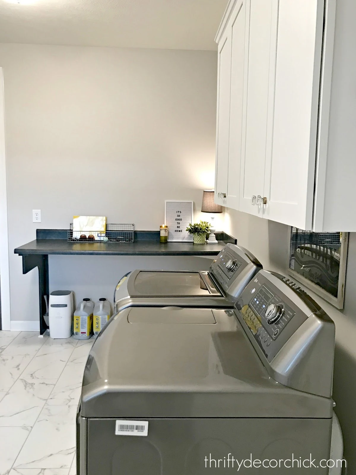 laundry room with folding table