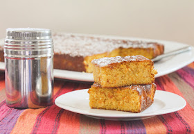Food Lust People Love: Super easy to make, the rich batter for these almond clementine cake squares is whipped up in a food processor with long simmered clementines, which you don’t even peel. I’ve been making versions of this cake for years with great success. As long as your guests like orange marmalade and almonds, they are going to be huge fans, I promise. This recipe is adapted from Nigella Lawson’s very first book, How to Eat, the Pleasures and Principles of Good Food, originally published in 1998. It is naturally gluten-free as long as you take care that your baking powder is gluten-free, of course.