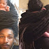 New dad causes mixed reactions for carrying his baby daughter wrapped in his dreadlocks (Photos)