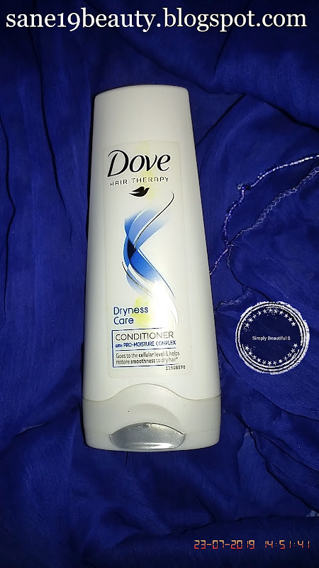 Packaging of Dove Hair Therapy Dryness Care Conditioner With Pro-Moisture. 