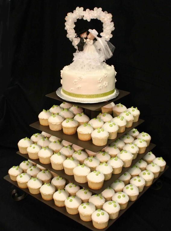 SKIP THE TRADITIONAL CAKE A beautiful cupcake display can be a stunning and 