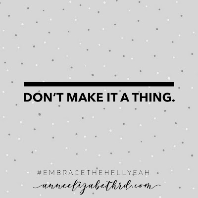 Inspirational Quote in black letters on grey background with white polka dots