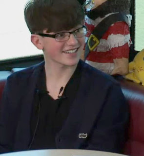 Greyson Chance wearing Glasses 2013 Video Tour Bus