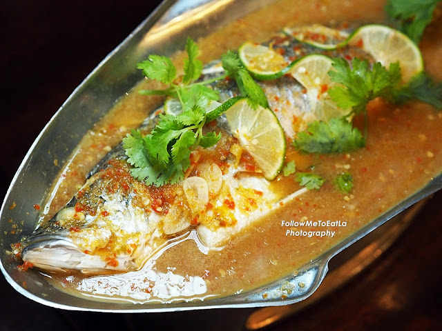 Pla Neung Manao ~ Steamed Seabass with fragrant lime broth.