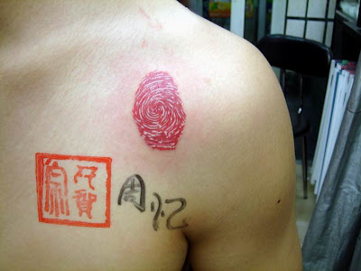 fingerprint tattoo od female artist