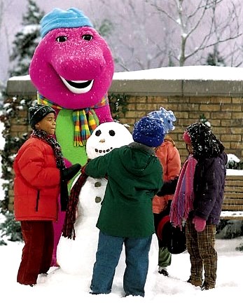 Foto de Barney y sus amigos haciendo un muñeco de nieve
