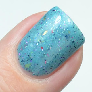 blue nail polish with glitter