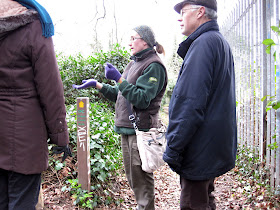 Sarah Adams explaining some woodland features to a group on the Green Chain Walk at Sundridge Park