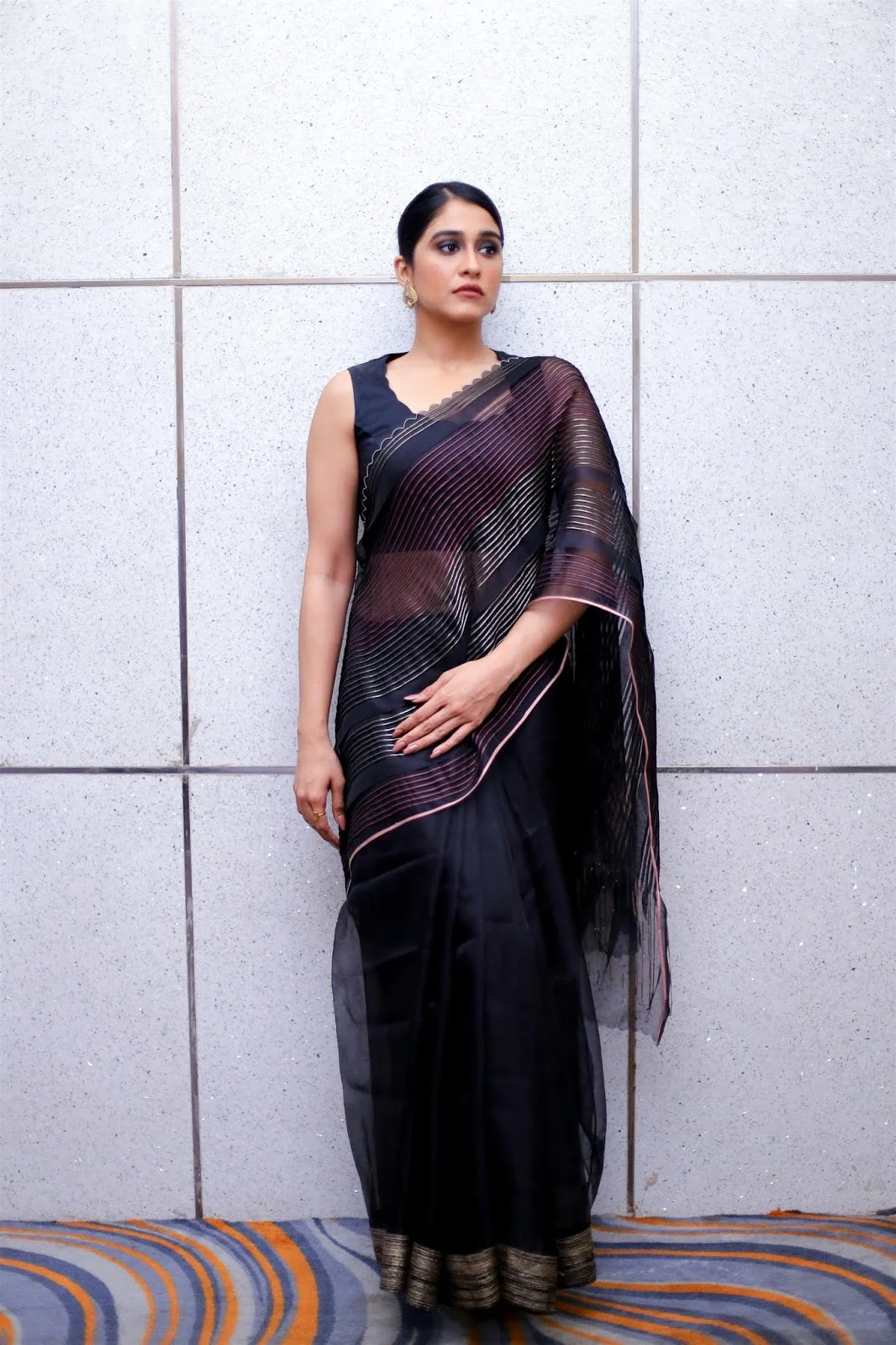 Actress Regina Cassandra Stylish Photoshoot In Saree