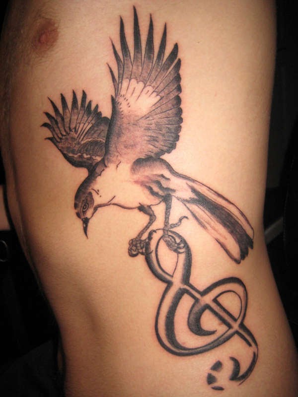 love bird tattoo. Beautiful Bird Tattoo