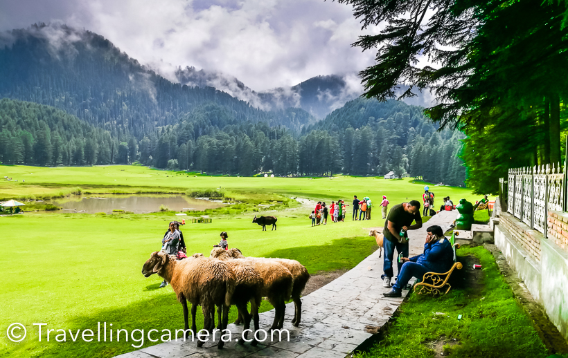 19. Khajjiar Lake, Himachal Pradesh  Nestled amidst the picturesque landscapes of Khajjiar, often referred to as the "Mini Switzerland of India," Khajjiar Lake is a serene water body surrounded by dense forests and lush meadows. The lake's crystal-clear waters reflect the surrounding Deodar trees and snow-capped mountains, creating a postcard-perfect setting that attracts nature lovers and honeymooners alike. Visitors can enjoy horse riding, picnicking, and admiring the panoramic views of the Dhauladhar range from Khajjiar's scenic viewpoints.
