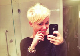 Miley Cyrus new look with short hair and platinum